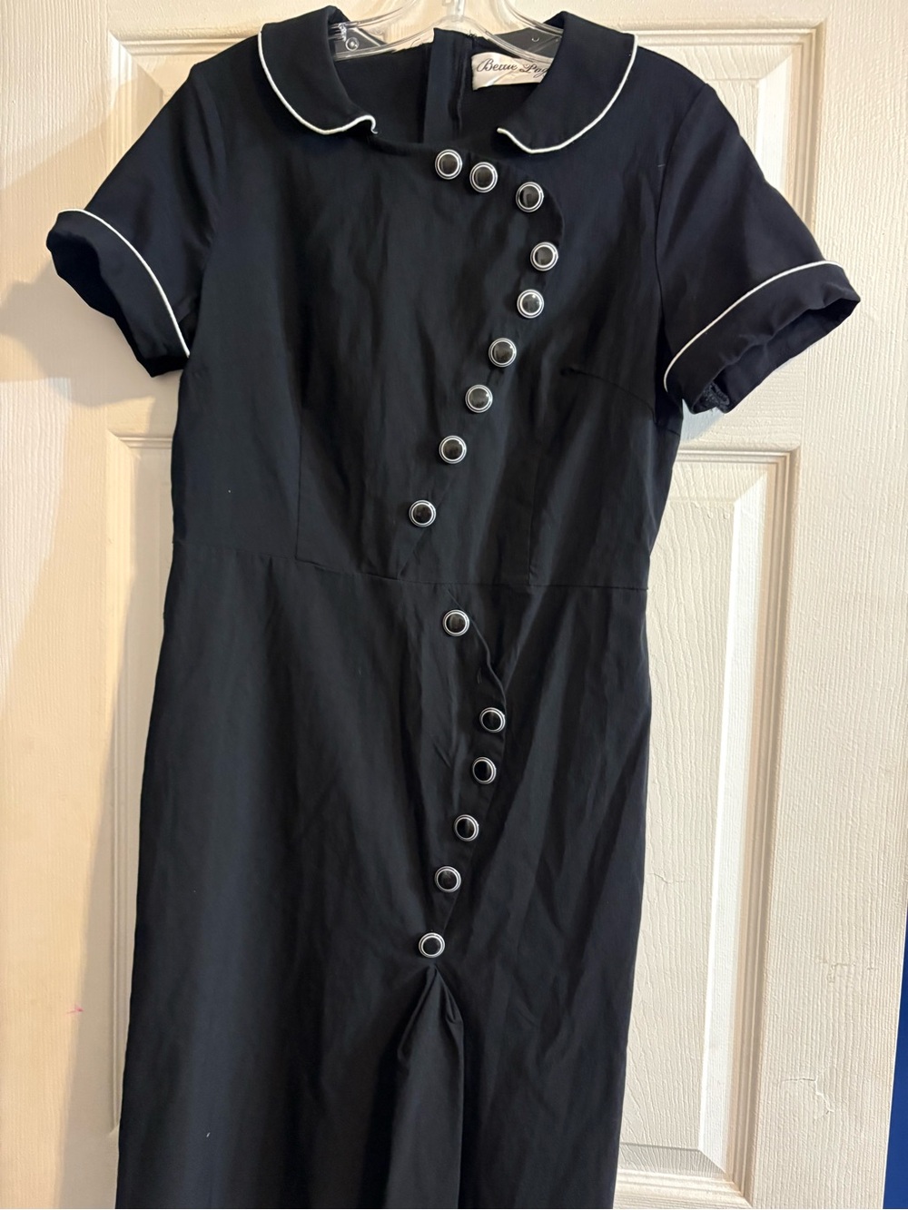 Bettie Page Black Dress with White Piping and Asymmetrical Button Detail